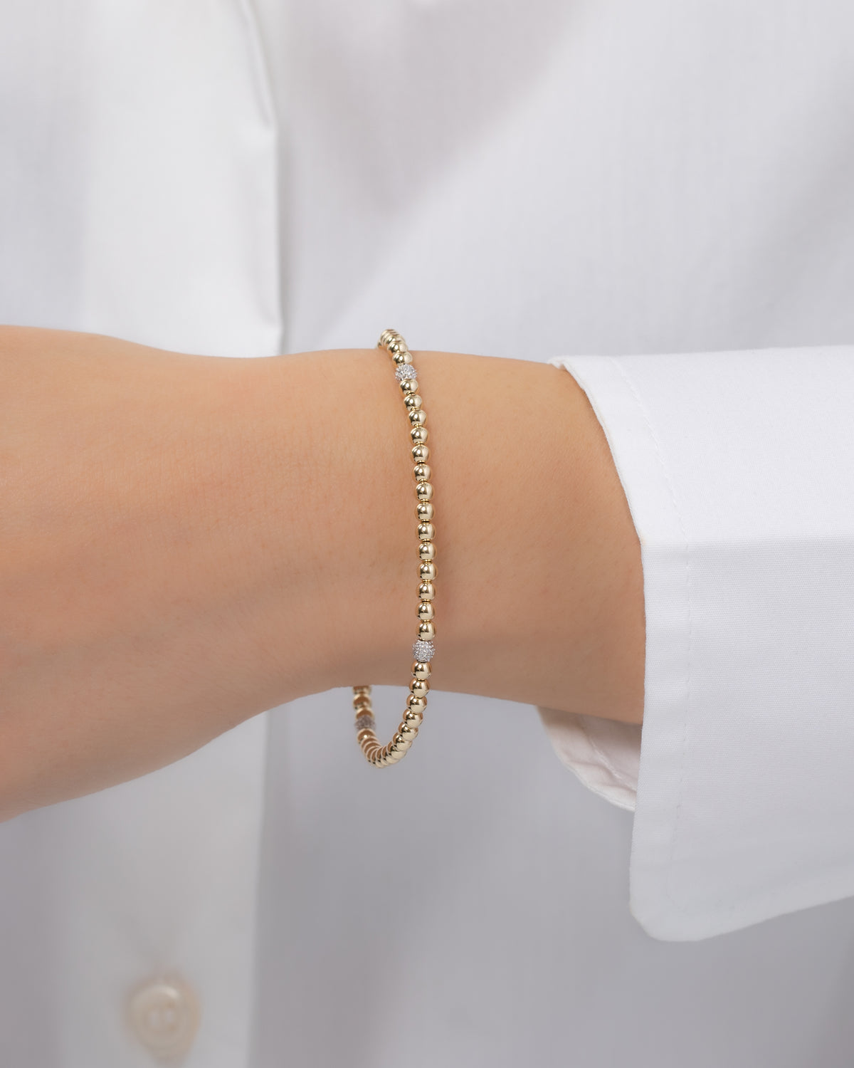 3mm Gold Segment Bead Bracelet with Diamond Beads