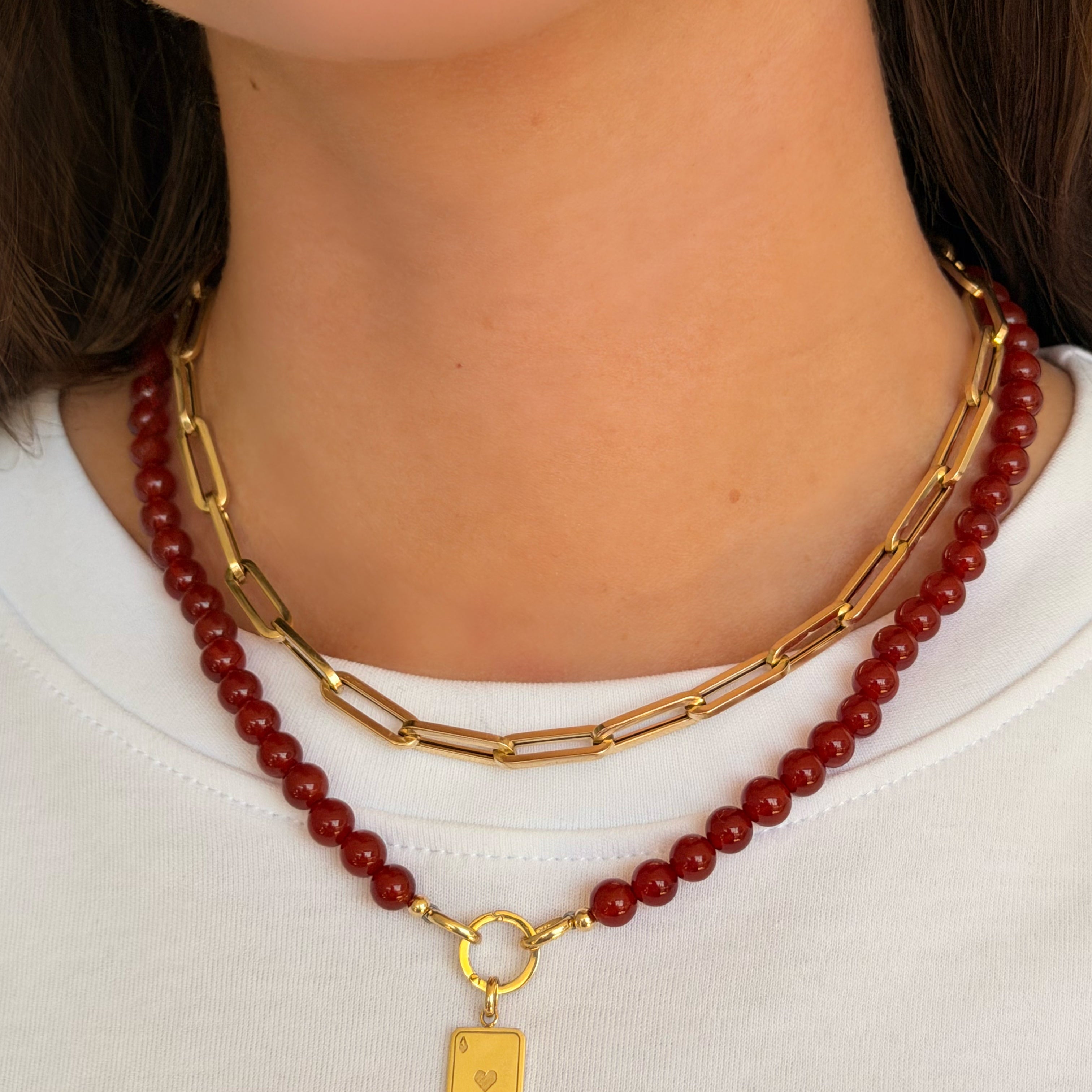 How to Dress Up a White Tee With Only Jewelry