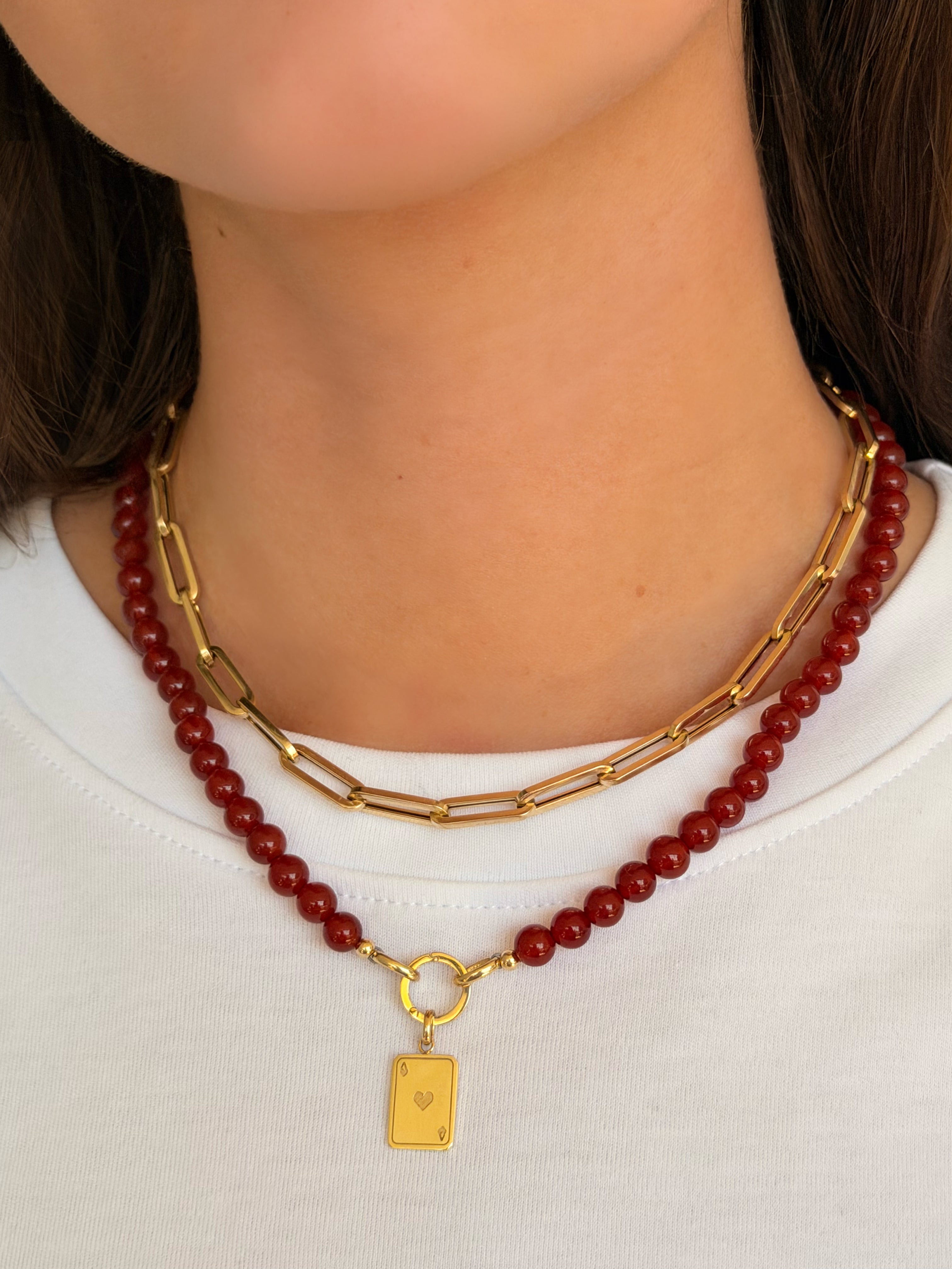 How to Dress Up a White Tee With Only Jewelry