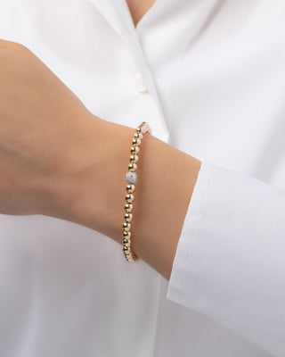 5mm Gold Bead Bracelet with Diamond Bead