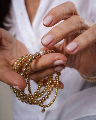 5mm Gold Bead Bracelet with Diamond Bead