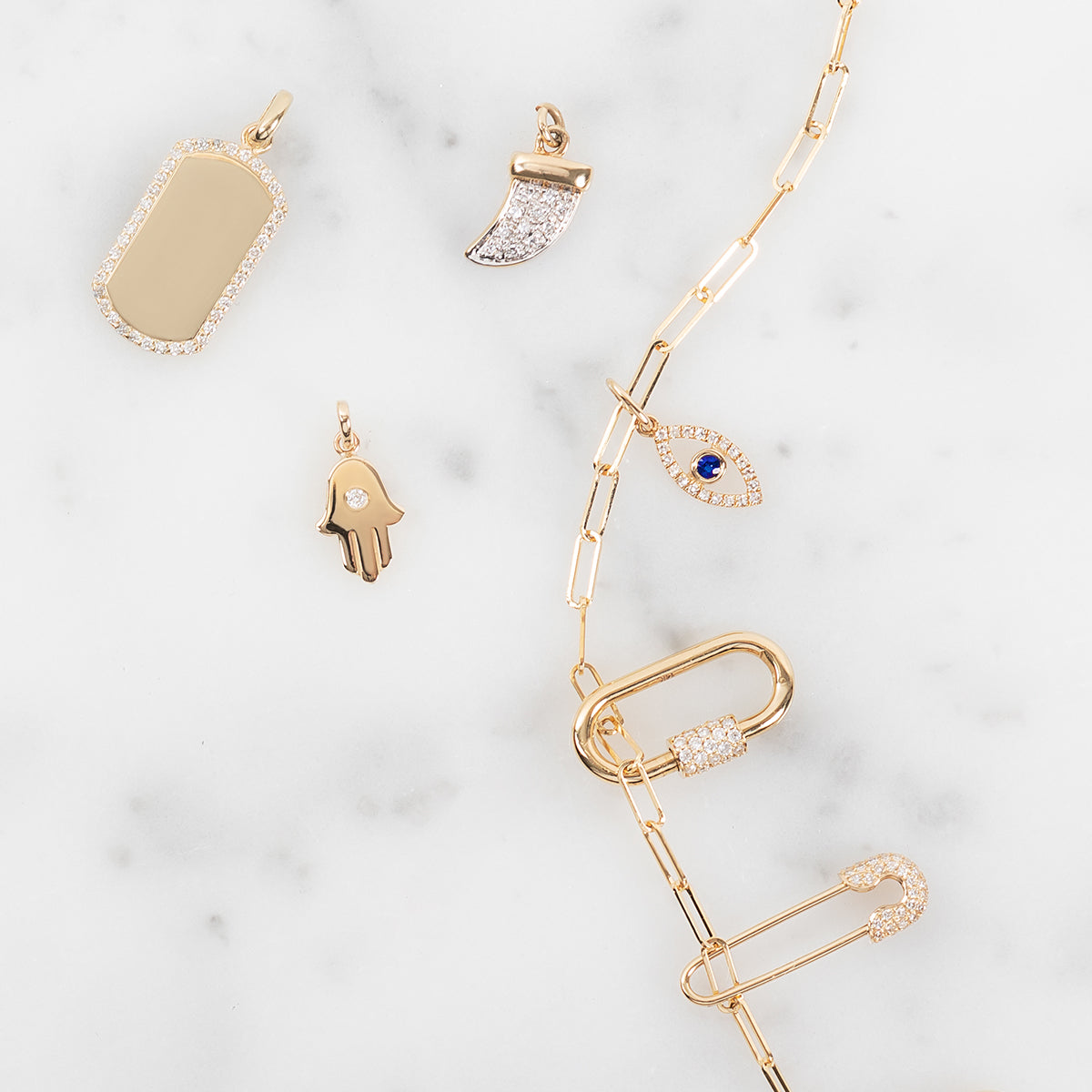 14k Gold Hamsa with Tiny Diamond Pendant